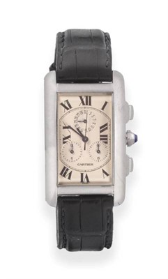 Lot 133 - An 18ct White Gold Calendar Chronograph Wristwatch, signed Cartier, model: Tank Americaine,...