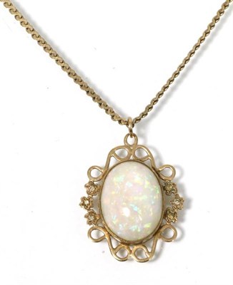 Lot 158 - An opal pendant on chain, an oval opal in a scroll frame, to a 9 carat gold S-link necklace, length