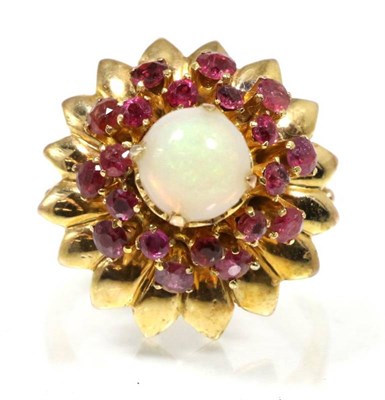Lot 166 - An opal and ruby cluster ring, a round cabochon opal within a border of round cut rubies and a...