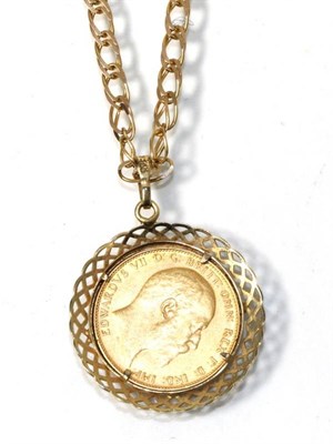 Lot 199 - An Edward VII, 1907 sovereign, loose mount in a 9 carat gold frame as a pendant, on a 9 carat...
