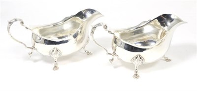 Lot 222 - A large pair of George III style silver sauce boats, WH&S, London 1989, 21cm long, 25.4ozt