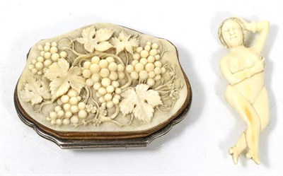 Lot 250 - A carved ivory mounted purse, circa 1900 decorated with fruiting vines; and a Japanese ivory...