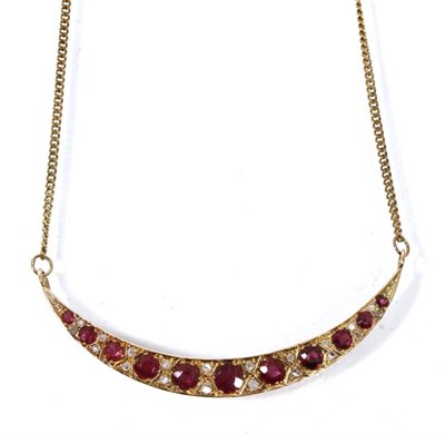 Lot 257 - A ruby and diamond crescent necklace, graduated round cut rubies spaced by rough cut diamonds,...