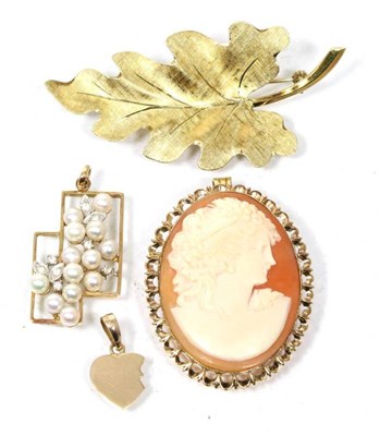 Lot 262 - A leaf brooch, stamped '585', measures 6cm by 3cm, 7.9g; cultured pearl pendant, a cameo...