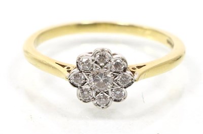 Lot 280 - An 18 carat gold diamond cluster ring, total estimated diamond weight 0.35 carat approximately,...