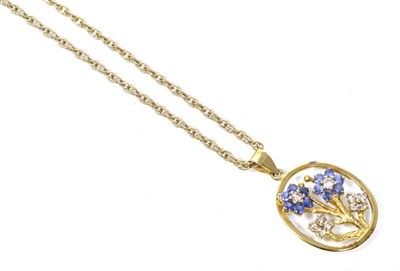 Lot 285 - A sapphire and diamond floral pendant, sapphire and round brilliant cut diamond set flowers...