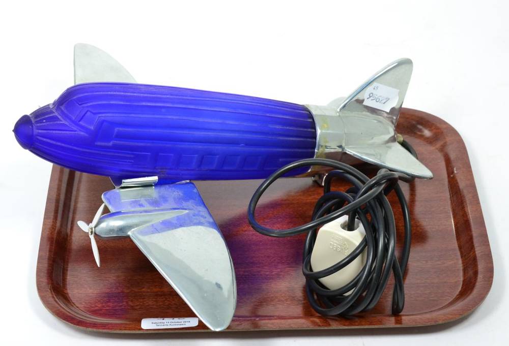 Lot 448 - A Sarsaparilla novelty blue glass and chrome plane table lamp