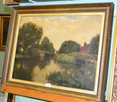 Lot 1056 - Late 19th Century canal landscape with a figure beside a lock, oil on canvas, indistinctly...