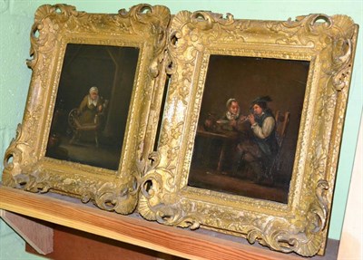 Lot 1063 - Dutch School 19th Cenutry, Figures sat at a table; and A woman at a spinning wheel, oil on...