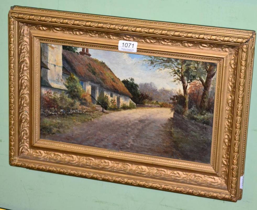 Lot 1071 - M S Hagarty, A thatched cottage on a country lane, oil on board, signed lower left, 23cm by 38cm