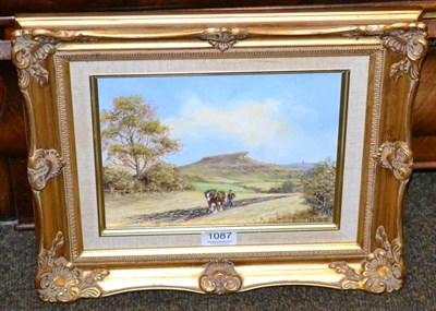 Lot 1087 - M Tate (20th century) Horse on country path