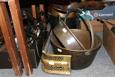 Lot 1132 - A brass fire kerb; twin handled jam pan; coal scuttle; cauldron etc