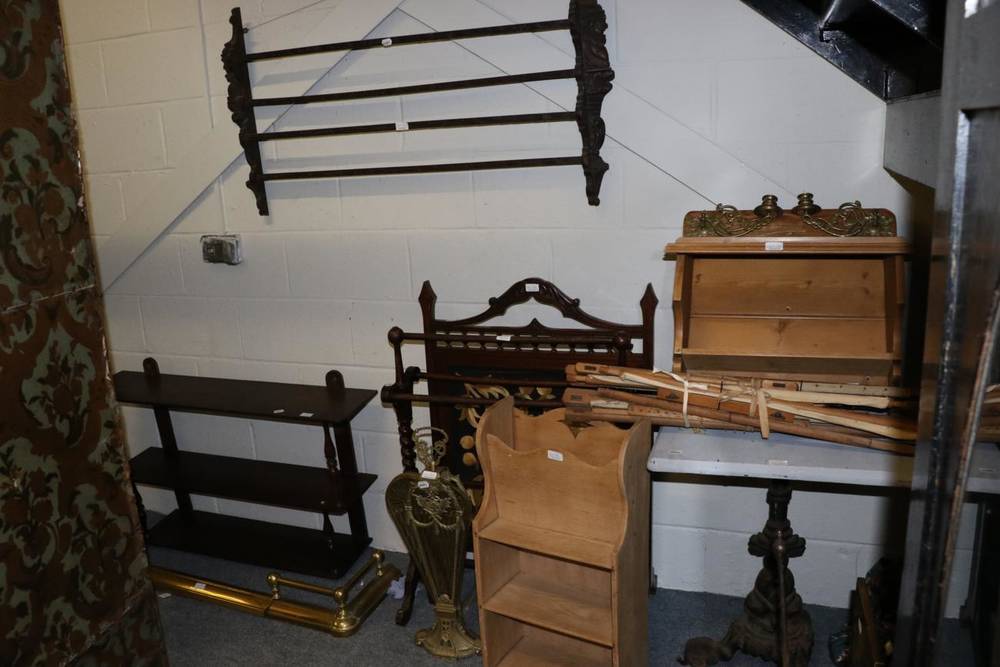 Lot 1147 A square table with cast base, two wall