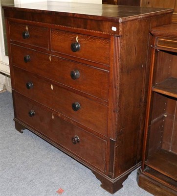 Lot 1155 - A mahogany four height chest of drawers