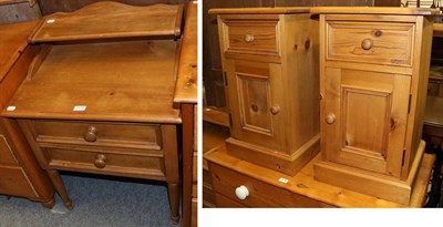 Lot 1177 - A pair of pine bedside cupboards and a two drawer bedside table (3)