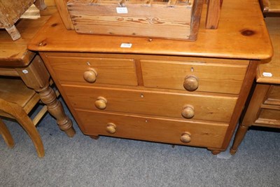 Lot 1179 - A pine three height chest of drawers