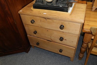 Lot 1181 - A pine three height chest of drawers