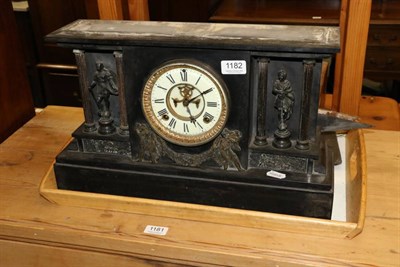 Lot 1182 - A Victorian black slate mantel clock of architectural form