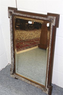 Lot 1190 - A rectangular wall mirror with bevelled mirror plate