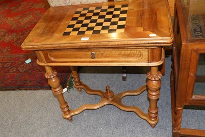 Lot 1193 - A foldover games table with chess board top