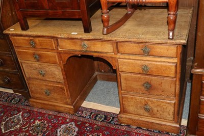 Lot 1197 - An oak desk