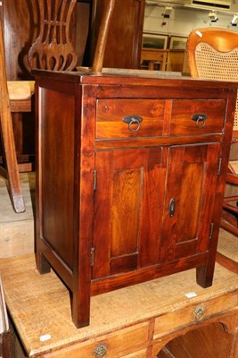 Lot 1198 - A teak bedside cupboard