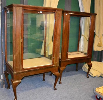 Lot 1231 - An early 20th century shop display cabinet on stand, with glazed panels and hinged door, on a stand