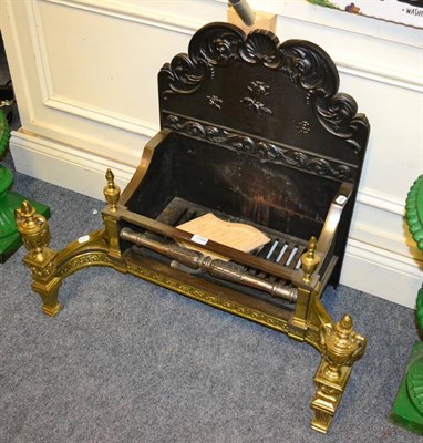 Lot 1244 - A Georgian style brass and steel fire grate