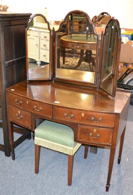 Lot 1249 - A line inlaid mahogany dressing table with a three section dressing table mirror and an upholstered