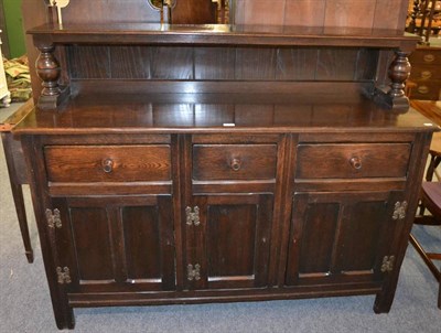 Lot 1251 - An oak sideboard