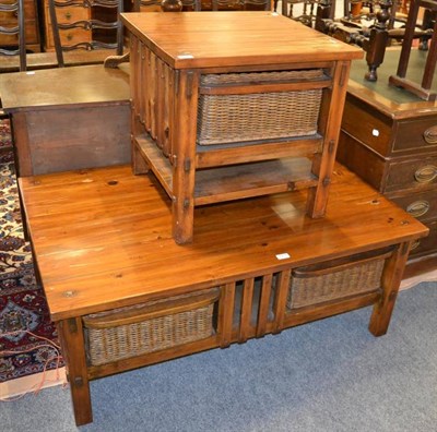 Lot 1257 - A modern rectangular coffee table with slide out wicker drawers and a matching square example