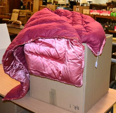 Lot 1259 - Assorted circa 1930s quilts, bed covers and eiderdowns including a pale pink satin and crepe...