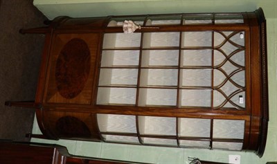 Lot 1270 - An Edwardian mahogany display cabinet, the dentil moulded integral cornice above central...