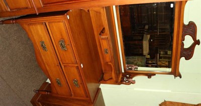 Lot 1279 - An Art Nouveau mahogany bedroom suite, comprising: dressing table with swing mirror back; a...