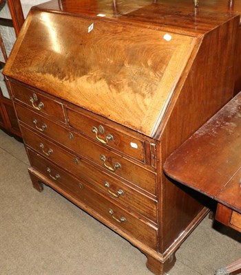 Lot 1299 - A George III mahogany bureau