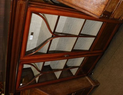 Lot 1300 - An Edwardian glass display cabinet