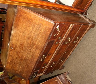 Lot 1301 - A George III oak bureau on bracket feet