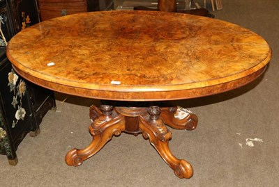 Lot 1313 - A Victorian figured walnut oval loo table