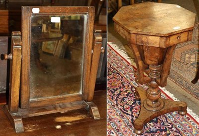 Lot 1319 - A Victorian walnut octagonal work table and a later oak dressing table mirror