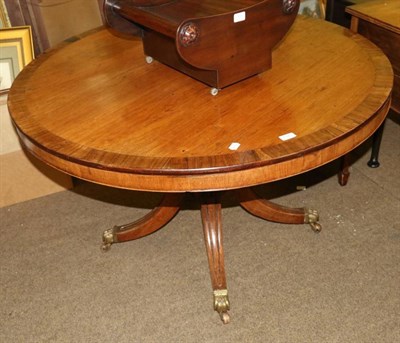 Lot 1323 - A George III mahogany circular top tilt top occasional table, baluster turned column to three...