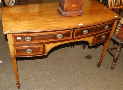 Lot 1324 - A mahogany sideboard on square tapering supports and with cross banded drawer fronts