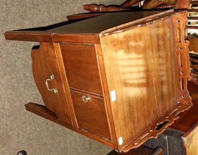 Lot 1328 - A mahogany bedside cabinet with pierced three quarter gallery top