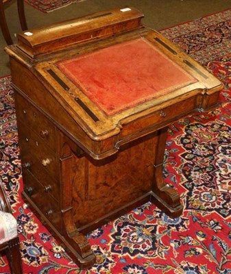 Lot 1359 - A Victorian walnut Davenport desk