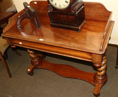 Lot 1369 - A Victorian mahogany washstand with galleried top