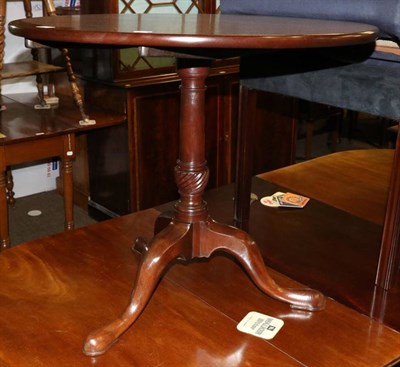 Lot 1375 - A George III tilt top tripod table