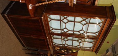 Lot 1382 - A cross banded mahogany glazed bookcase