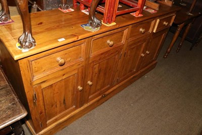 Lot 1386 - A pine sideboard