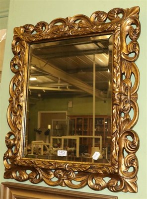 Lot 1413 - A carved wood gilt framed mirror