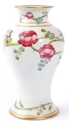 Lot 221 - William Moorcroft (1872-1945) for James Macintyre & Co. Ltd: A Rose Garland Pattern Vase, circa...