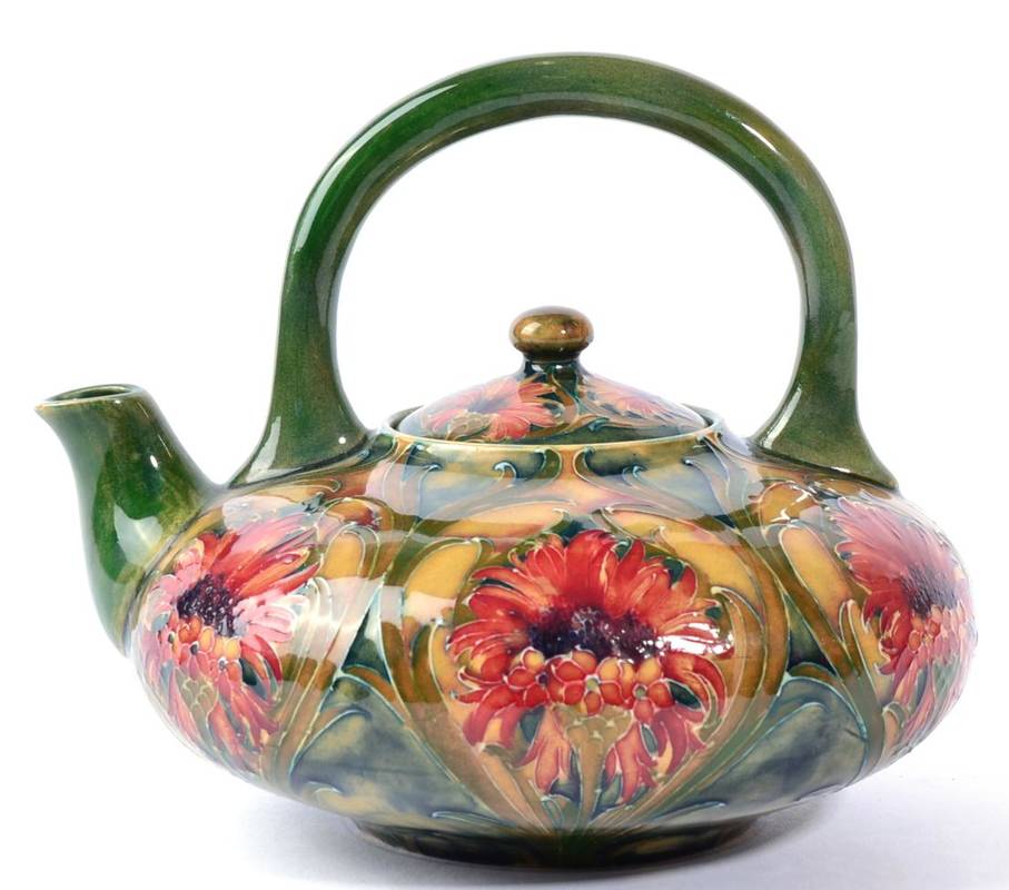 Lot 223 - William Moorcroft (1872-1945): A Revived Cornflower or Brown Chrysanthemum Pattern Teapot,...